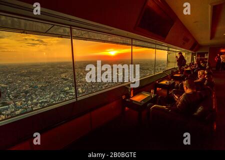 Yokohama, Japan - April 21, 2017: tourists relaxing inside viewing platform of Yokohama Landmark Tower in Minato Mirai 21 district. Observatory, Sky Stock Photo