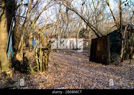 Decaying and overgrown ruins of Zalyssia, one of the abandoned towns in the 30 km radius of the Chernobyl exclusion zone. Stock Photo