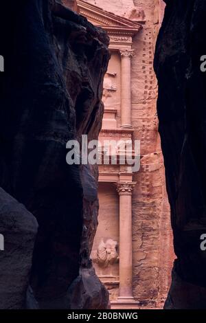 View to Al Khazneh, the Treasury, from inside the Siq, Petra, Jordan Stock Photo