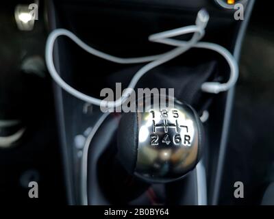 Close up of shift knob with 6 gears in car interior Stock Photo