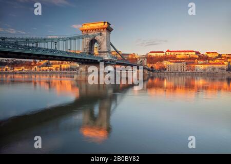 Budapest, Hungary. Cityscape image of Budapest skyline with the Szechenyi Chain Bridge building during beautiful winter sunrise. Stock Photo