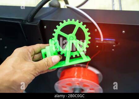 hand with Object printed on 3d printer close-up Stock Photo