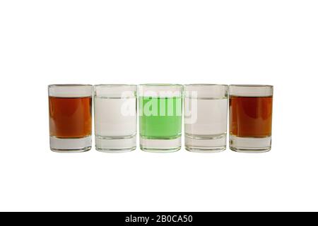 Multicolored transparent cocktails, a set of shots in one row, five servings. Side view Isolated white background. Drink for the menu restaurant, bar, Stock Photo