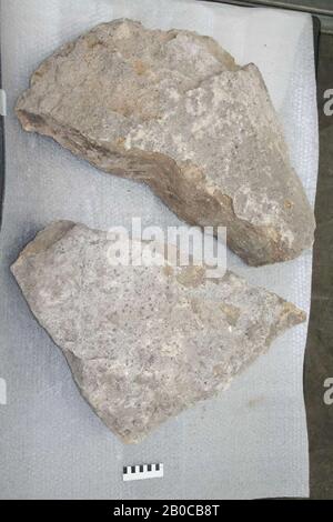 Construction fragment of tuff broken into 2 pieces. Loose pieces on the surface. Building fragment stone tuff 75 x 75 x 17 cm 71 kg Netherlands unknown unknown unknown Stock Photo Alamy