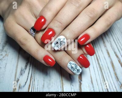 beautiful gel lacquer manicure on a textured trendy background Stock Photo