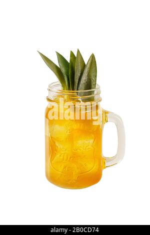Multi-colored two-layer opaque cocktail in glass with ice cubes, melon, pear, apple, berries, fruit, pineapple leaves, orange, apricot, peach, side vi Stock Photo