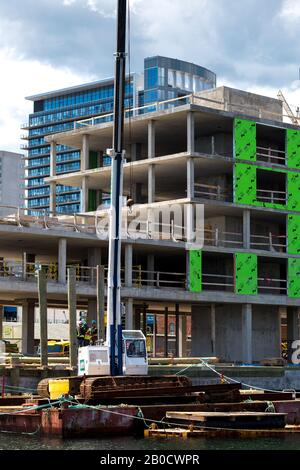 Canada, halifax office harbour construction work. Construction workers. Stock Photo