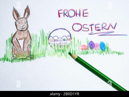 Happy Easter painted on a sheet of paper in german Stock Photo