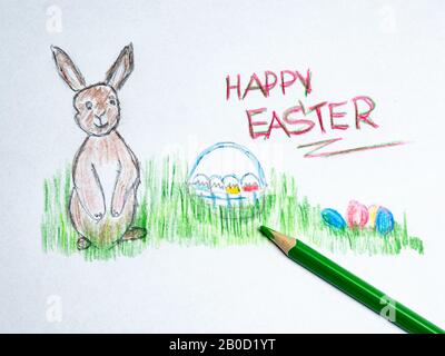 Happy Easter painted on a sheet of paper Stock Photo