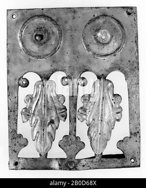 Rectangular plate of silver-plated bronze. At the top, two circular decorative motifs were cast out next to each other (see e 1931 Stock Photo