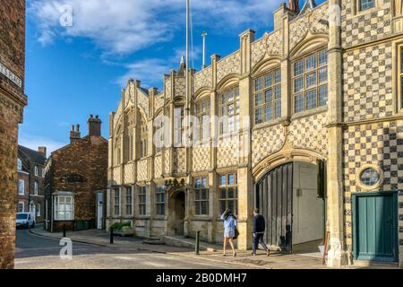 Chequerboard pattern of dressed flint flushwork on the front of the 15th century Town Hall & Trinity Guildhall in King's Lynn, Norfolk. Stock Photo