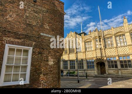 Chequerboard pattern of dressed flint flushwork on the front of the 15th century Town Hall & Trinity Guildhall in King's Lynn, Norfolk. Stock Photo