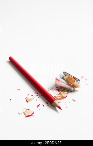 Red pencil and sharpener. Stock Photo
