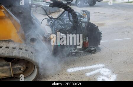 Close up of tractor with milling cutter for asphalt Stock Photo