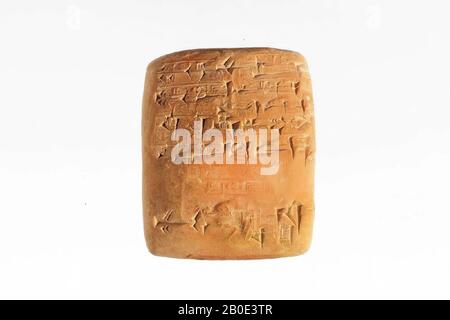 A rectangular clay tablet with a cuneiform inscription. The text is an acknowledgment of receipt for textiles., Inscription, pottery, clay, L 5.2 cm, W 4.2 cm, H 0.8 cm, Ur III Period 2112-2004 BC, Iraq Stock Photo