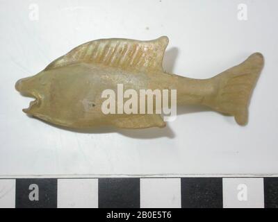 This fish is blown free of decolored glass. The animal swims to the right in an energetic movement. The tail and dorsal fin are strongly modeled. At first sight the piece looks like a vial, but the curvature of the body and a fastening trail on the concave rear point to another destination. The animal has been part of a large showcup, which is referred to by the term 'conchillian cup'. On such cups, which have been found in Cologne and Trier, dozens of sea creatures, sea snails and shells are arranged in a lively setting. When such a cup was filled with wine and moved, the animals actually Stock Photo