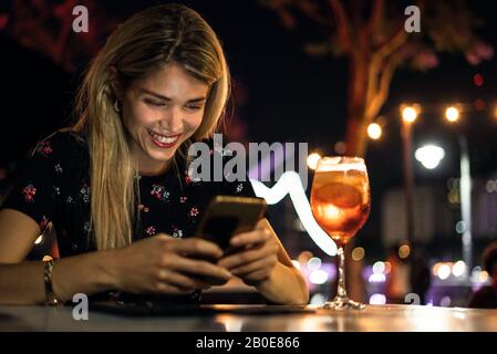 Young woman using smart phone Stock Photo