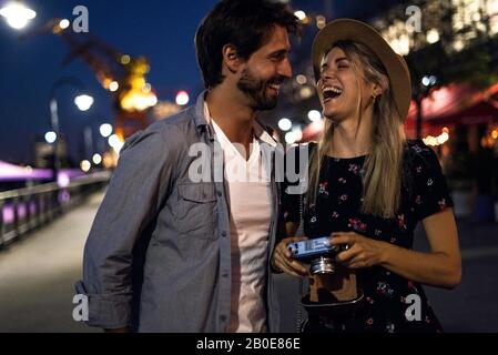Close-up of young couple standing on street Stock Photo