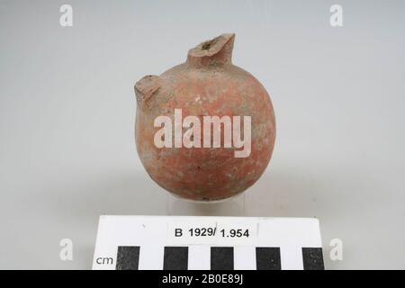 A large fragment of a small jug with a convex body. Neck, rim and ear are missing, crockery, pottery, H 8.6 cm, D 7.1 cm, Palestine Stock Photo