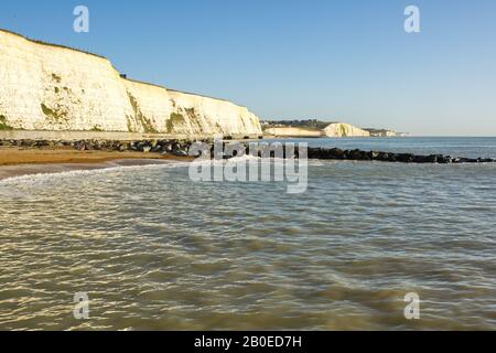 Seafront and chalk cliffs at Rottingdean near Brighton in East Sussex, England Stock Photo