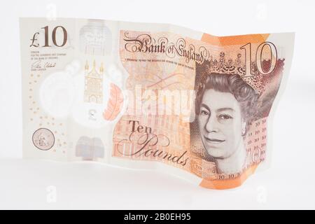 A crumpled ten pound note Stock Photo