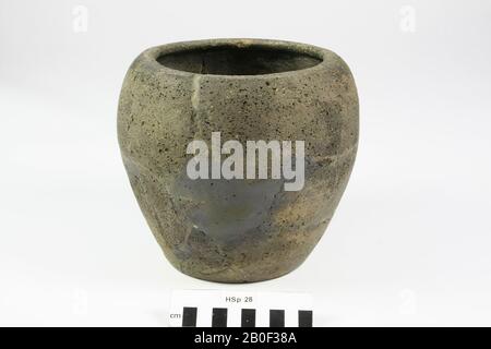 Roman cylindrical urn made of cork-like, rough-walled earthenware. With old glues and additions., Urn, earthenware, h: 16.8 cm, diam: 19 cm, roman, Netherlands, Limburg, Mook and Mediator, Mook Stock Photo