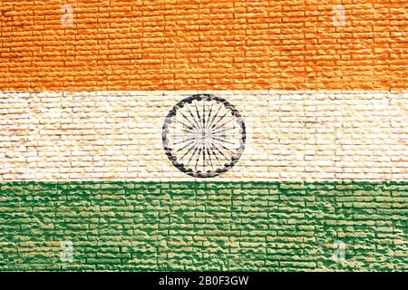 India flag painted on a grunge brick wall. India and Indian language and culture concept Stock Photo