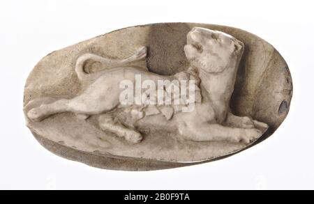 a lying lioness or panther with the front legs next to each other, the hind legs over each other and the tail above the abdomen waving. The animal has turned the head to the left and draped a vine over the back., Cameo, stone, agate, Color: white and gray, opaque, Shape: oval, lying., 19 x 35 mm. Thickness 8.5 mm., Netherlands, unknown, unknown, unknown Stock Photo