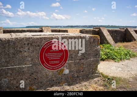 A plaque marking the Lepe Beach construction and embarkation site for Mulberry harbours crucial in Operation Overlord during World War Two Stock Photo