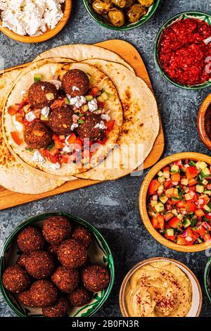 Falafel - traditional dish of Israeli and Middle Eastern cuisine, top view. Stock Photo