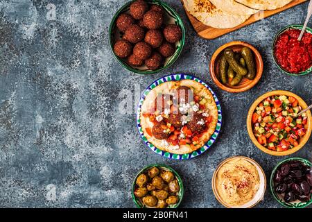 Falafel - traditional dish of Israeli and Middle Eastern cuisine, top view. Stock Photo