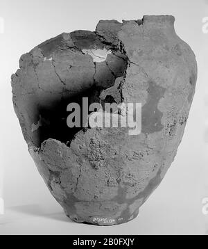 Germanic urn of earthenware with serrated edge. On the shoulder thumb impressions. Many glueing and additions, ca. 1 Stock Photo