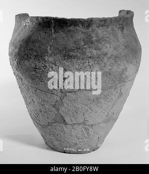 Germanic urn of earthenware with serrated edge. Unstable old bonds and additions, gap in the edge Stock Photo