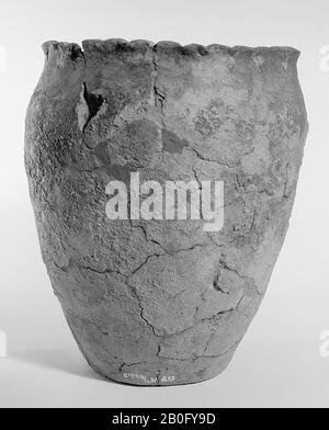 Large Germanic urn of earthenware with serrated edge. Part of the edge Stock Photo