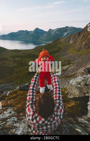 Baby with father family traveling in mountains healthy lifestyle outdoor adventure vacations with kids vibes in Norway Stock Photo