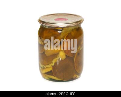 Glass jar with canned mushrooms on white background. Stock Photo