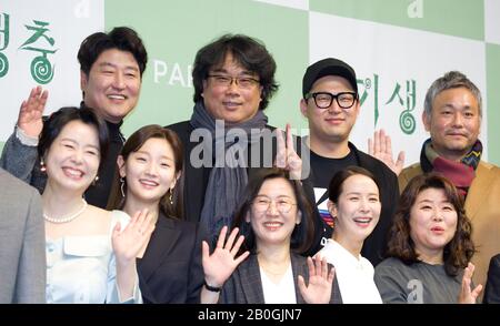 Song Kang-Ho, Bong Joon-Ho, Han Jin-Won, Lee Ha-Jun, Jang Hye-Jin, Park So-Dam, Kwak Sin-Ae, Cho Yeo-Jeong and Lee Jung-Eun, Feb 19, 2020 : (L-R, 2nd row) Actor Song Kang-Ho, director Bong Joon-Ho, screenwriter Han Jin-Won and production designer Lee Ha-Jun pose with (L-R, front row) actress Jang Hye-Jin, Park So-Dam, film producer Kwak Sin-Ae, actress Cho Yeo-Jeong and Lee Jung-Eun during a press conference held for their Oscar-winning film 'Parasite' in Seoul, South Korea. The Korean black comedy thriller won four Oscar titles at the Academy Awards on Feb 9, 2020, becoming the first non-Engl Stock Photo