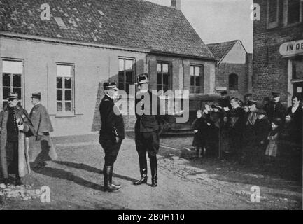 The King of the Belgians Albert the first talking to the French General Joffre in a village near Ypres Belgium circa 1915 during World War One Stock Photo