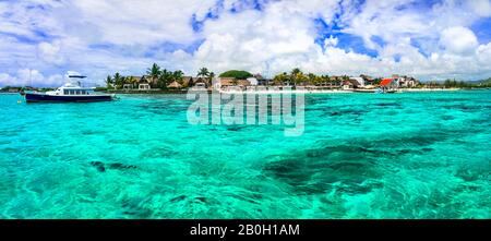 Mauritius island resorts .Blue bay with crystal waters. Tropical island scenery Stock Photo