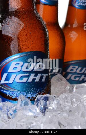 IRVINE, CA - MAY 30, 2014: Closeup of three Bud Light Beer Bottles in ice. From Anheuser-Busch InBev, Bud Light is the top selling domestic beer in th Stock Photo