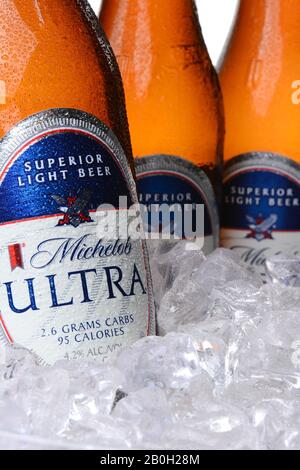 IRVINE, CA - MAY 30, 2014: Closeup of Michelob Ultra bottles in ice. Introduced in 2002 Michelob Ultra is a light beer with reduced calories and carbo Stock Photo