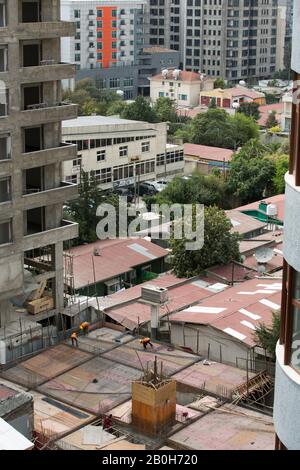 01.11.2019, Addis Ababa, Addis Ababa, Ethiopia - Construction site in the city centre. Construction workers laying reinforcement on a building site. 0 Stock Photo