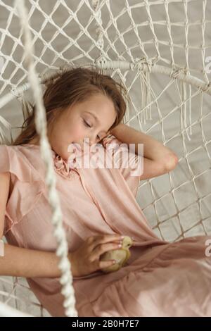 Easter kids playing with rabbits and ducks Stock Photo