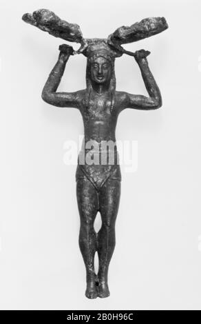 Bronze patera handle in the form of a young woman, Greek, Archaic, Date last quarter of the 6th century B.C., Greek, Bronze, length 7 5/8in. (19.3cm), Bronzes Stock Photo