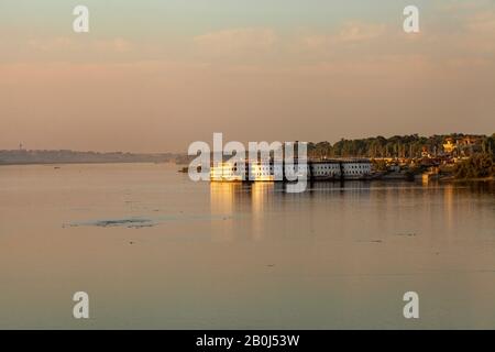 River cruise ships moored on the Nile at Aswan, Egypt Stock Photo