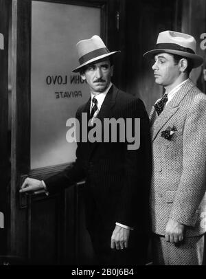 OSGOOD PERKINS and PAUL MUNI as Tony Camonte in SCARFACE 1932 directors HOWARD HAWKS and RICHARD ROSSON novel Armitage Trail screen story Ben Hecht producer Howard Hughes The Caddo Company / United Artists Stock Photo
