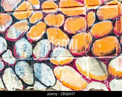 Texture of colored cladding tiles of the building facade. Stock Photo