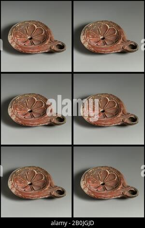 Terracotta oil lamp, Roman, Cypriot, Early Imperial, Date ca. A.D. 50–100, Roman, Cypriot, Terracotta, Overall: 7/8 x 3 1/2 in. (2.2 x 8.9 cm), Terracottas Stock Photo