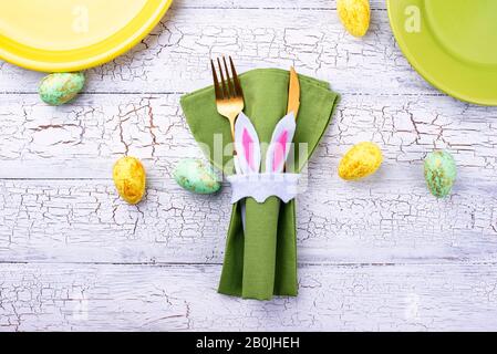 Easter table setting in green color Stock Photo