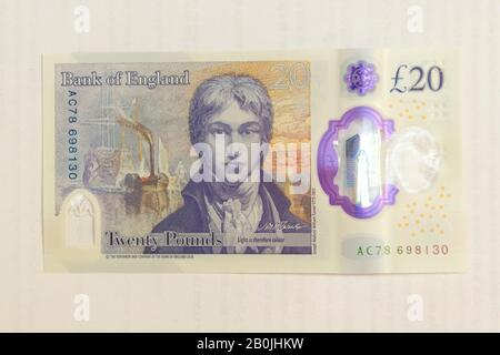 London, UK. 20th Feb, 2020. Photo taken on Feb. 20, 2020 shows the new 20 pound note in London, Britain. Deemed as 'the most secure ever' note issued by the Bank of England, the latest 20 pound note has gone into circulation Thursday. The new polymer note features the famous English watercolor artist Joseph Mallord William Turner. Credit: Ray Tang/Xinhua/Alamy Live News Stock Photo